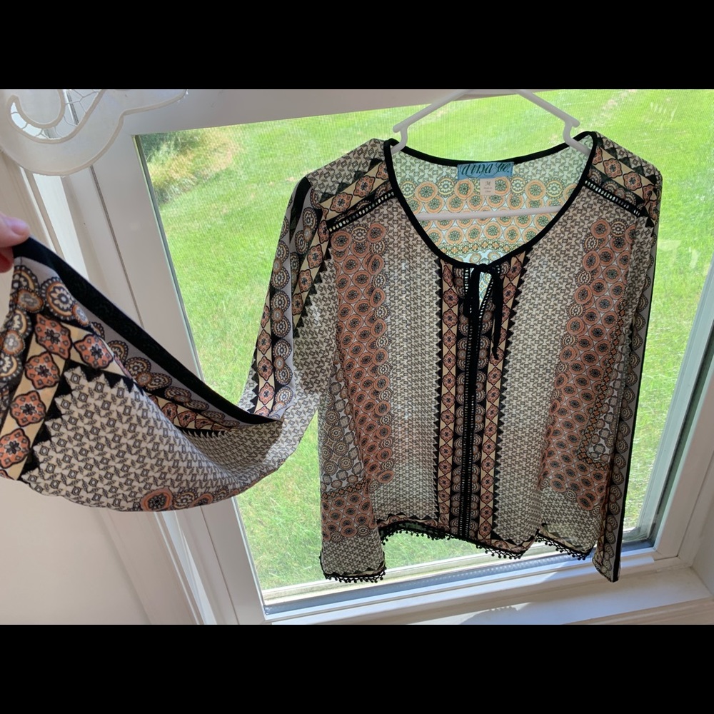 Francesca’s patterned Blouse